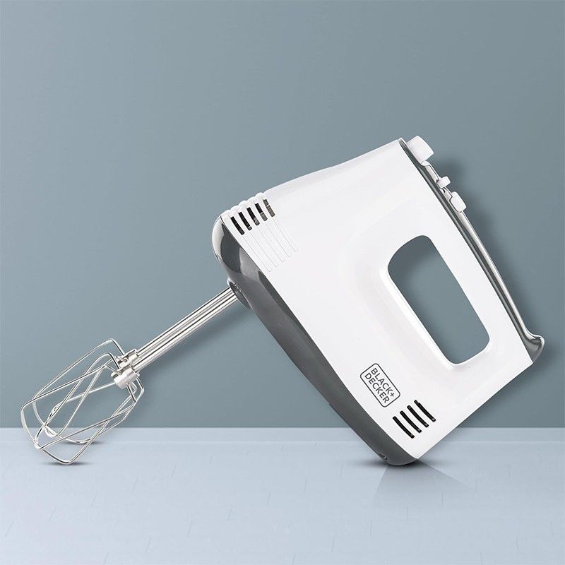 5-speed hand mixer with turbo and stainless steel attachments.